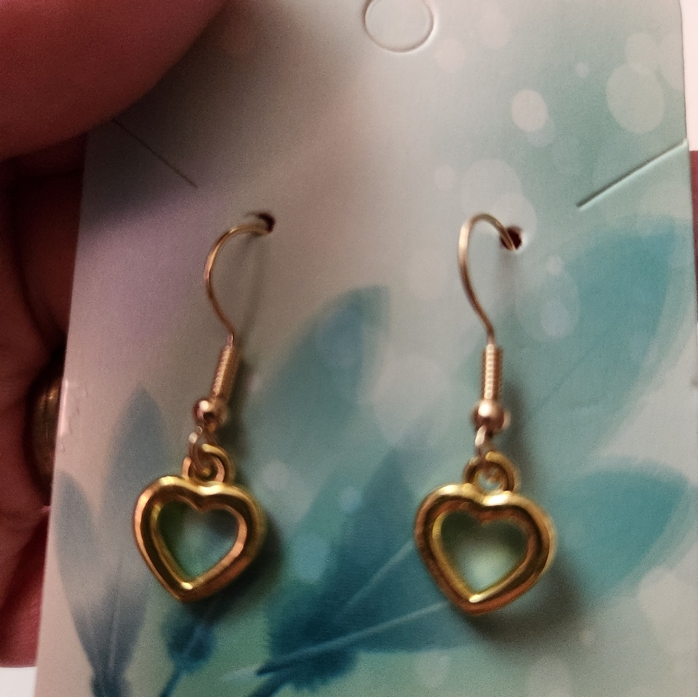 Gold tone heart shaped earrings